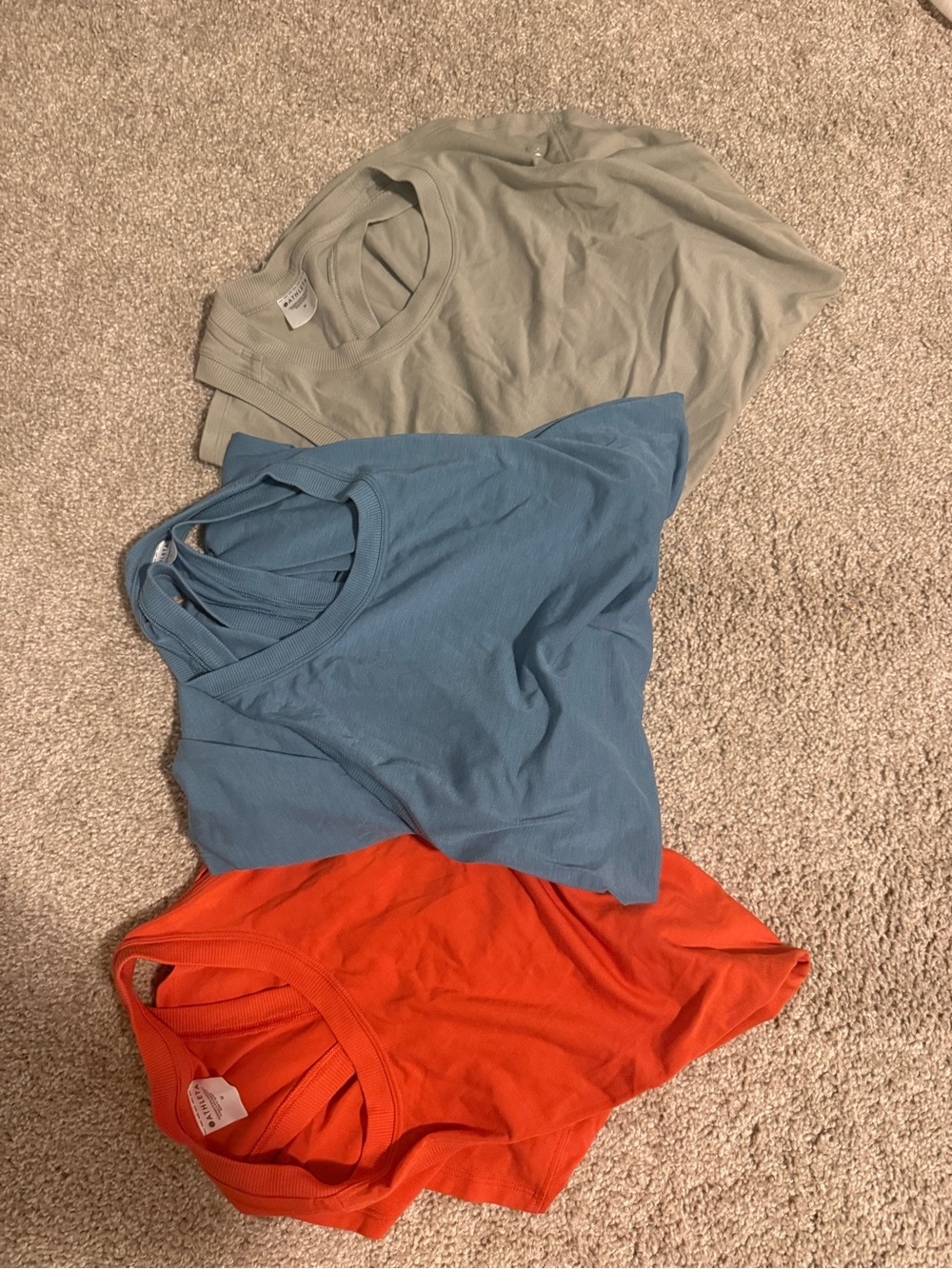 Set of Three Athleta Tanks in Assorted Colors